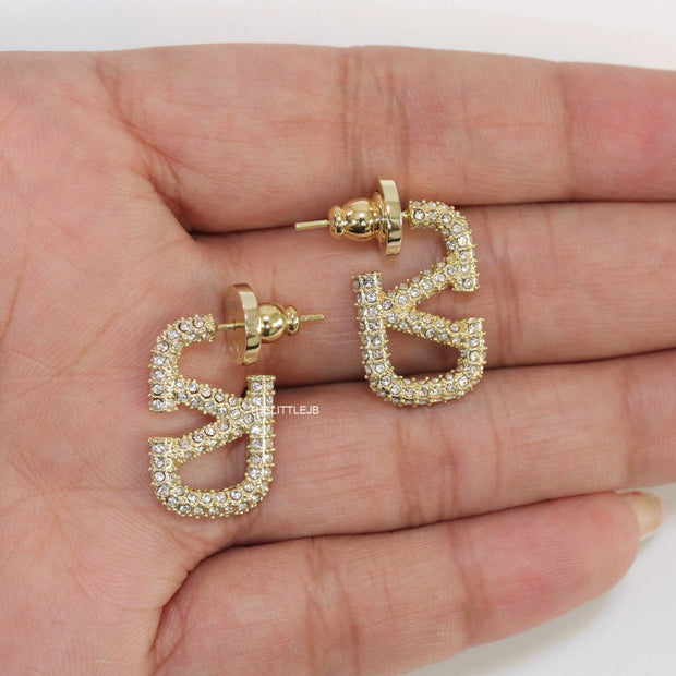 Golden cz alphabet studs with letter V