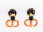 Black and Orange alphabet C and D stud in gold finish
