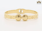 Embossed gold bracelet