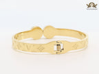 Embossed gold bracelet