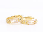 Double F hoops in gold finish with cz