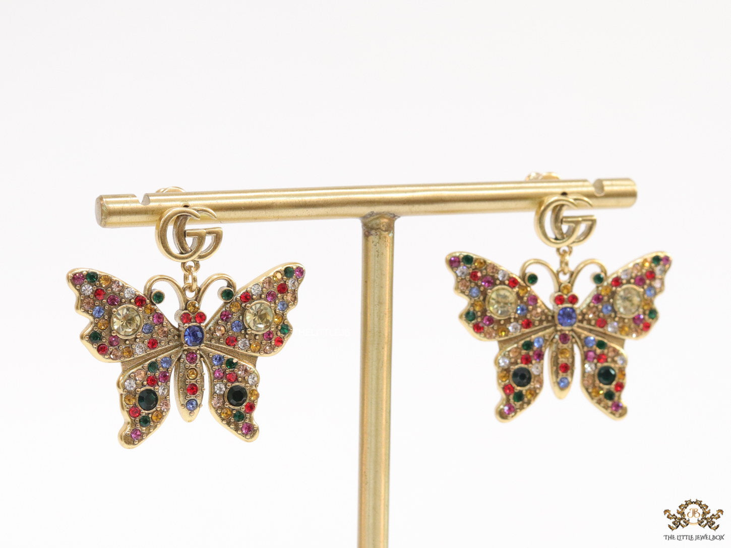 Gold plated twin G motif earrings with multi cz butterfly drops