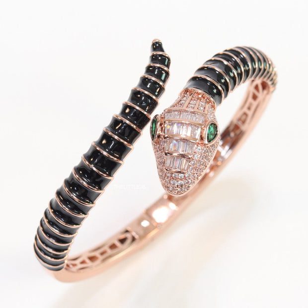 Top open snake bracelet in black enamel with rose gold plated details and cubic zirconia stones head