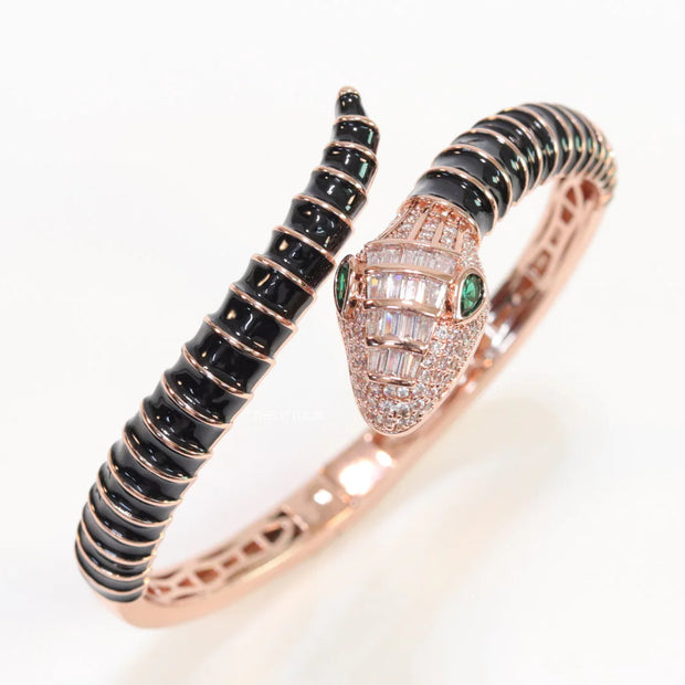 Top open serpentine bracelet in black enamel with rose gold plated details and cubic zirconia stones head