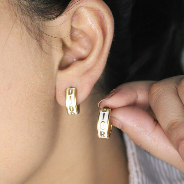 Alphabet D white hoops with gold detaling