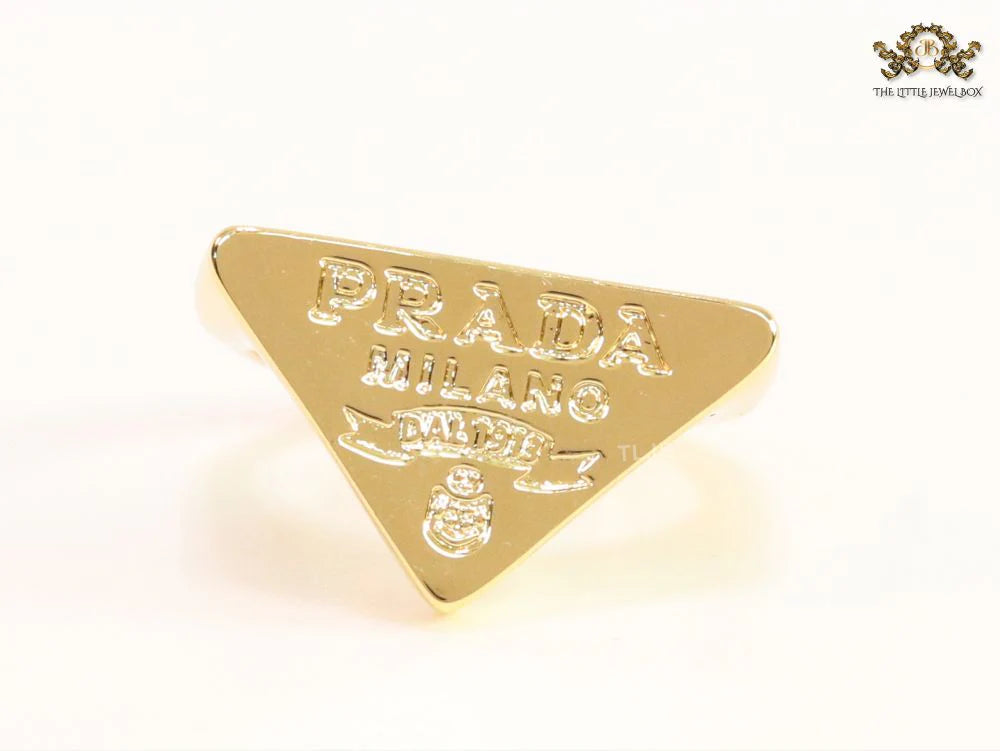 Alphabet embossed gold plated ring