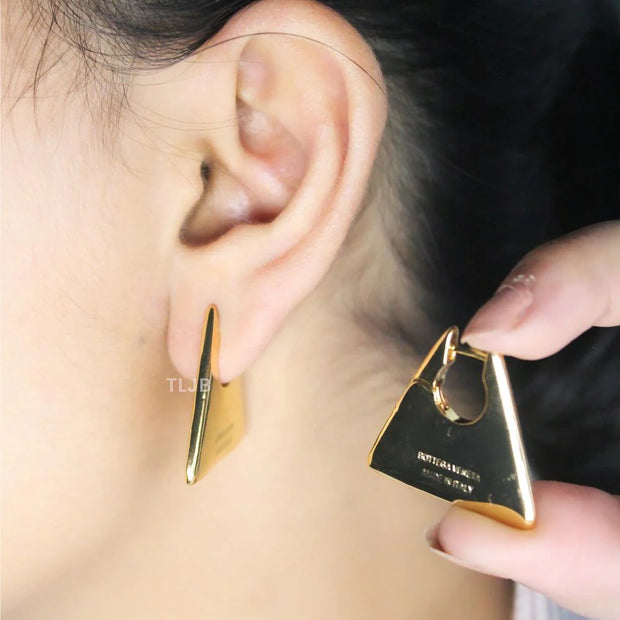 Alphabet BLC gold toned earrings