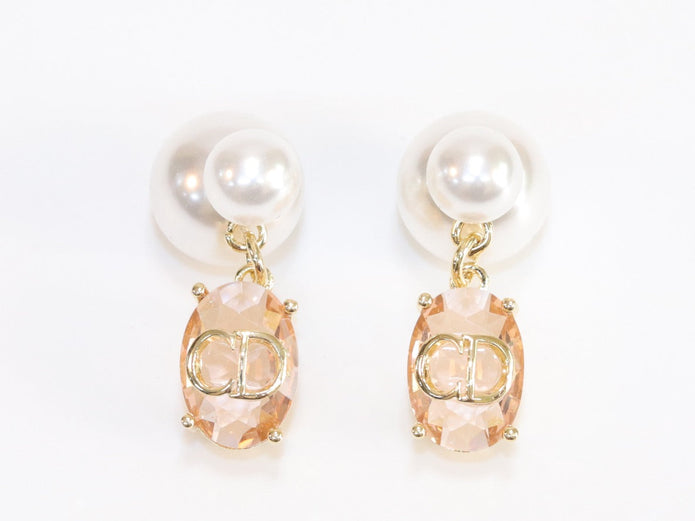 Alphabet C and D dangling baby pink stone pearl studs in rose gold finish