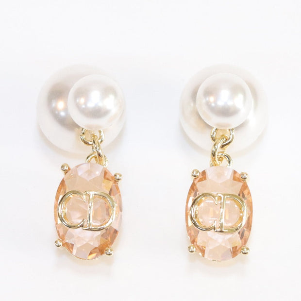Alphabet C and D dangling baby pink stone pearl studs in rose gold finish