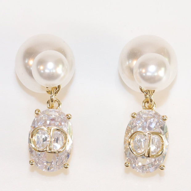Alphabet C and D dangling stone pearl studs in platinum finish