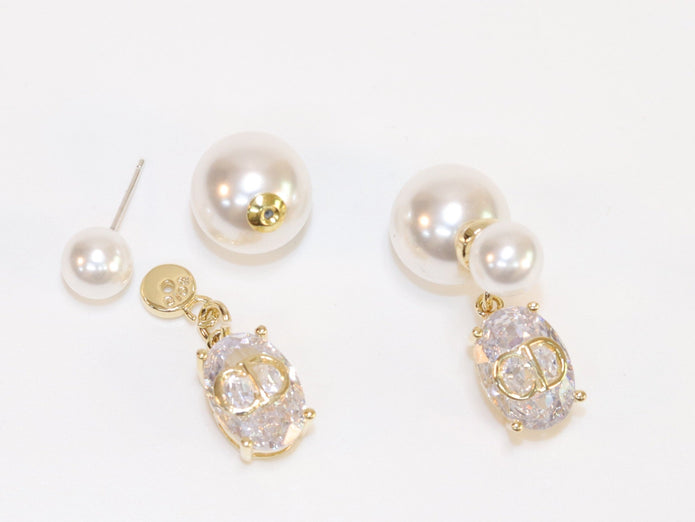 Alphabet C and D dangling stone pearl studs in platinum finish
