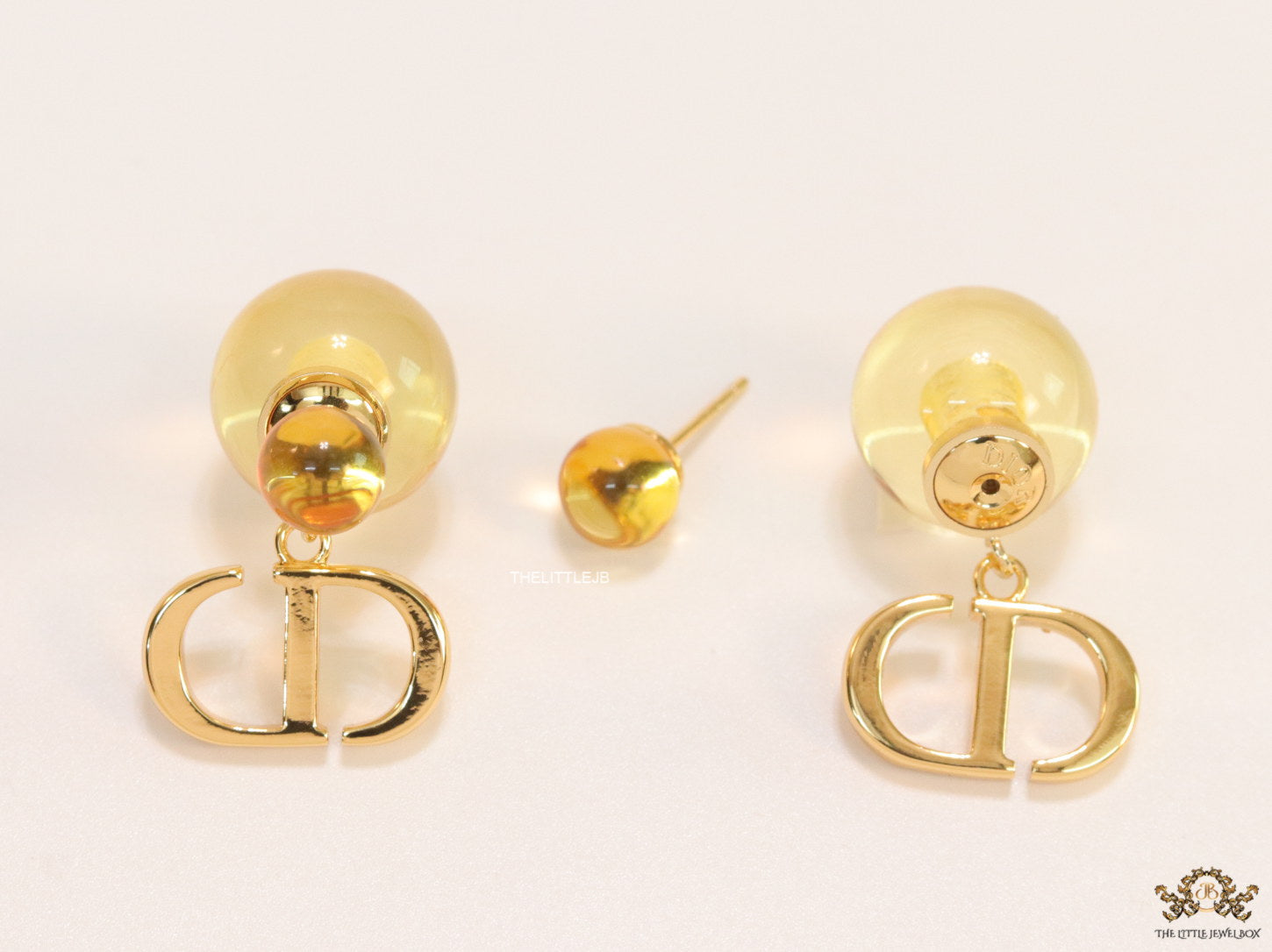 Golden pearl bomber earrings with alphabet initial drops