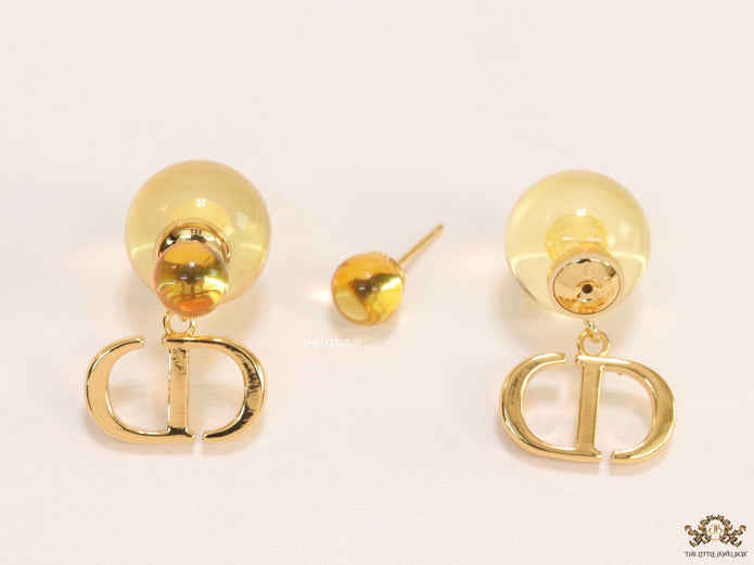 Golden pearl bomber earrings with alphabet initial drops