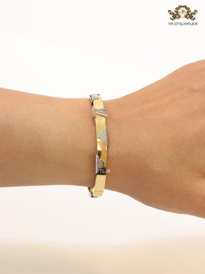 Alphabet L- platinum and gold bracelet