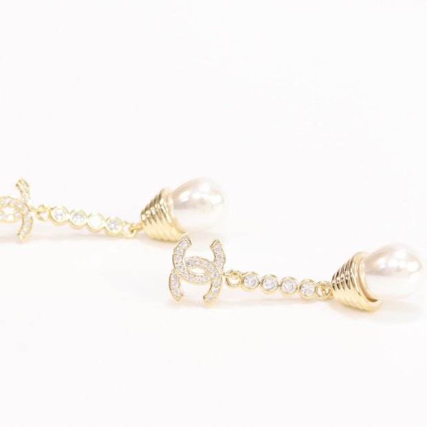 Double C long dangling earrings with pearls in gold finish