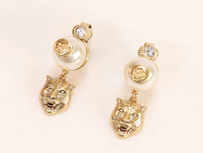 Double G panther pearl dangles in gold finish with CZ