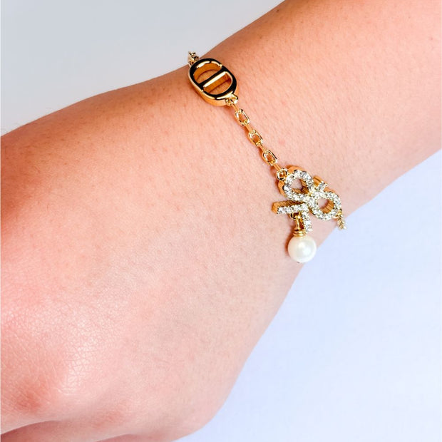 Gold Bow CZ Bracelet with Pearl Charm