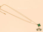 Gold plated chain with malachite stone clover pendant
