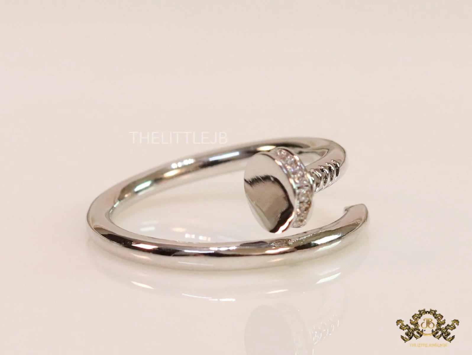 Platinum plated cz nail ring