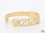 Gold plated designer bracelet with gold plated Medusa face motif