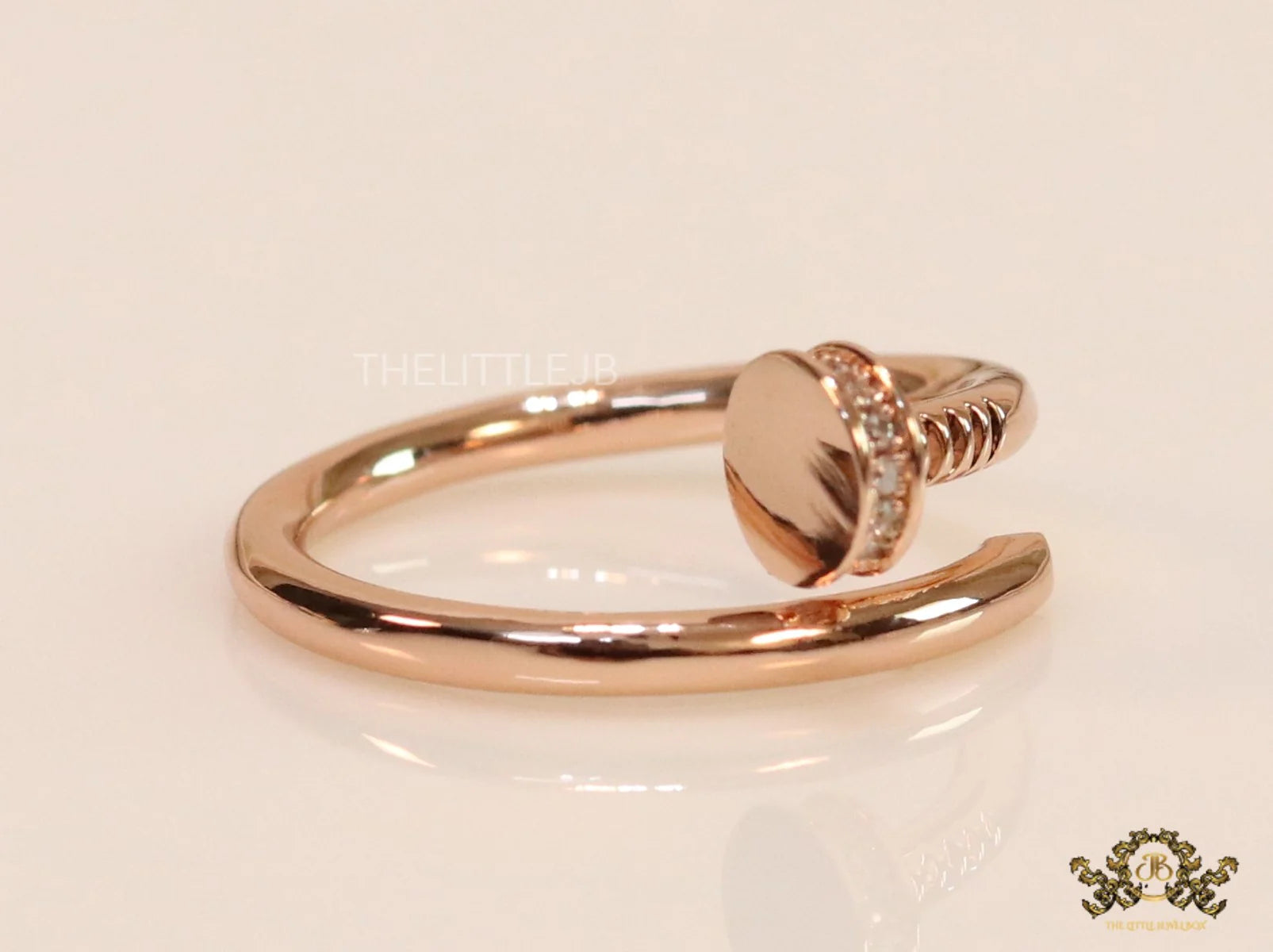 Rose gold plated cz nail ring