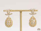 Golden twin C cz earrings with fancy cz lobe shape drops