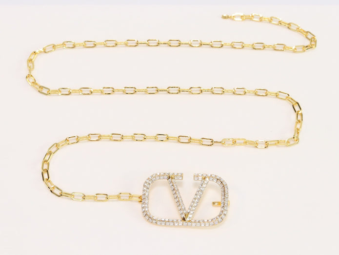 Open V and gold chain waist belt