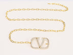 Open V and gold chain waist belt