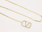 Open V and gold chain waist belt