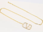 Open V and gold chain waist belt