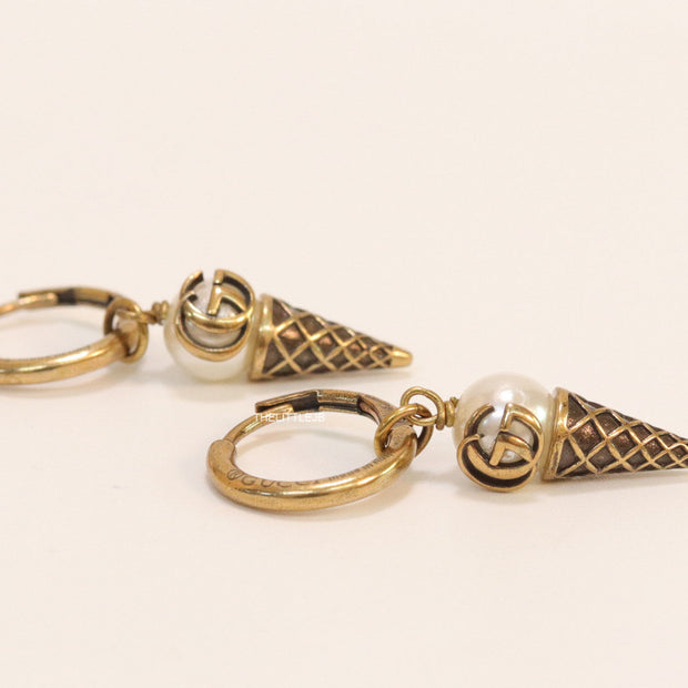 Small gold plated hoops with twin G and softy drops