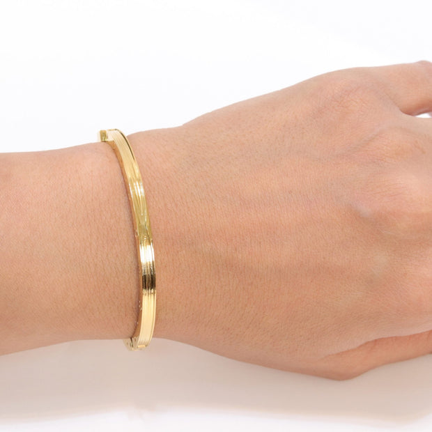 Alphabet B Sleek bracelet in gold finish