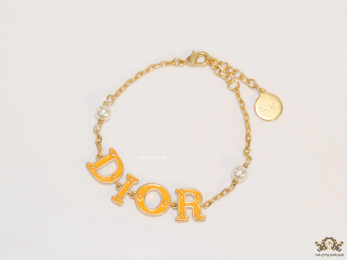 Alphabet bracelet with gold plated chain