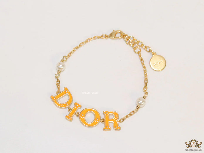 Alphabet bracelet with gold plated chain