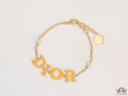 Alphabet bracelet with gold plated chain