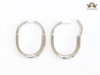 Alphabet T & Co. platinum and cz oval hoops