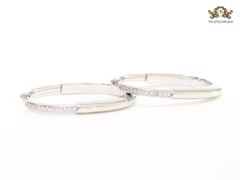 Alphabet T & Co. platinum and cz oval hoops