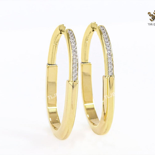 Alphabet T & Co. gold and cz oval hoops