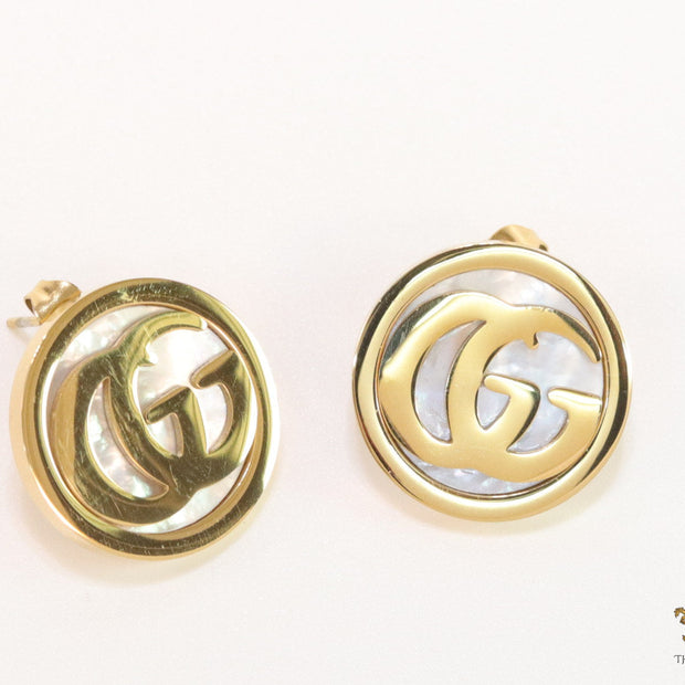 Gold plated twin G motif studs with MOP