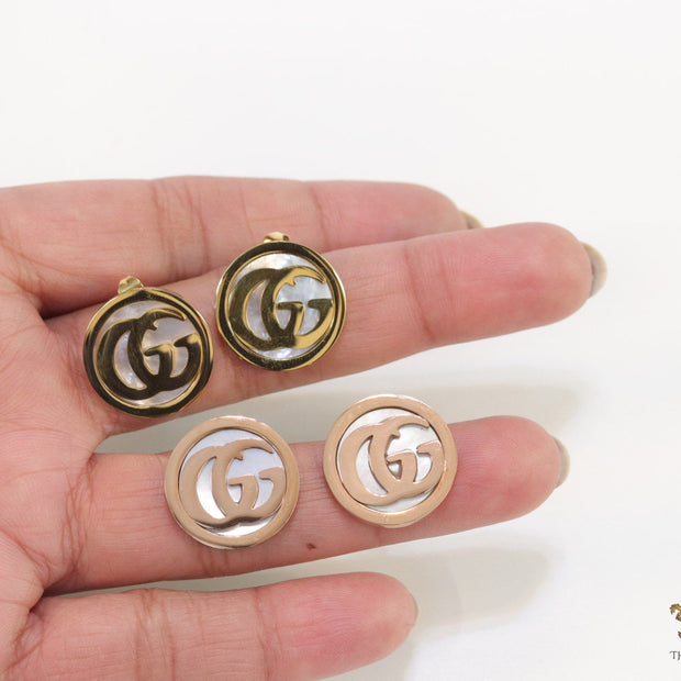 Rose gold plated twin G motif studs with MOP