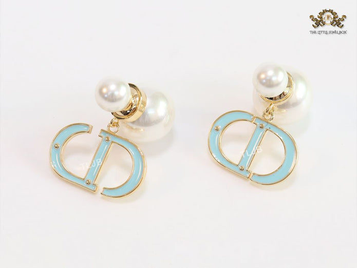 Pearl and aqua blue enamel CD bombers