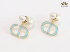Pearl and aqua blue enamel CD bombers