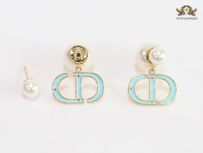 Pearl and aqua blue enamel CD bombers