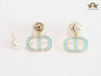 Pearl and aqua blue enamel CD bombers