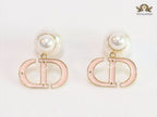 Pearl and baby pink enamel CD bombers