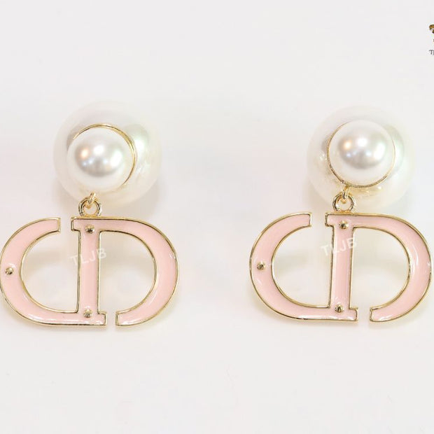 Pearl and baby pink enamel CD bombers