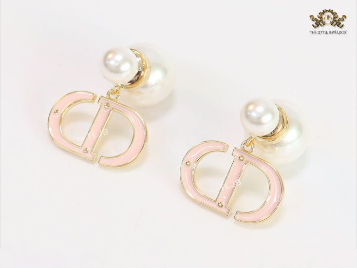 Pearl and baby pink enamel CD bombers