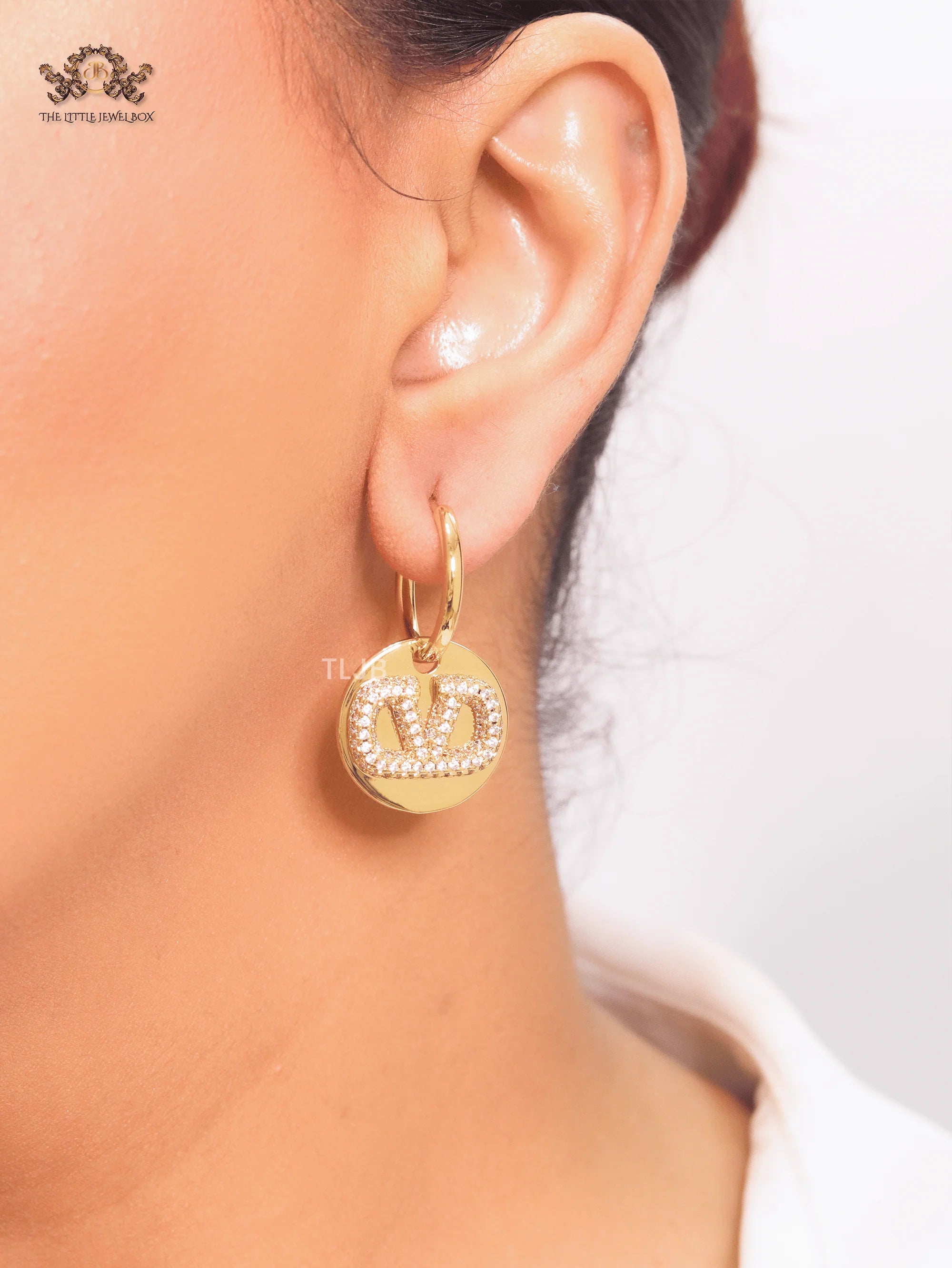 Alphabet V CZ studded earrings