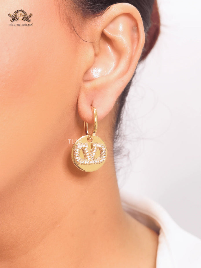 Alphabet V CZ studded earrings