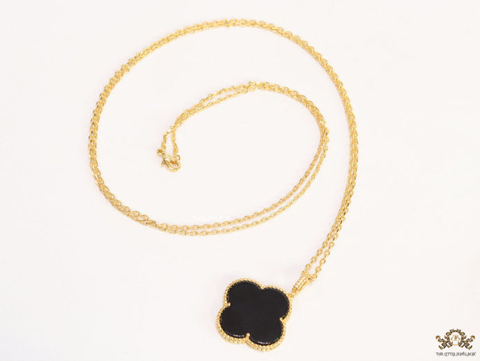 Black enamel clover pendant in gold plated chain